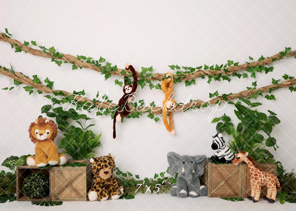Kate Jungle Plush Animals Wooden Crates Greenery Backdrop Designed by Melissa King